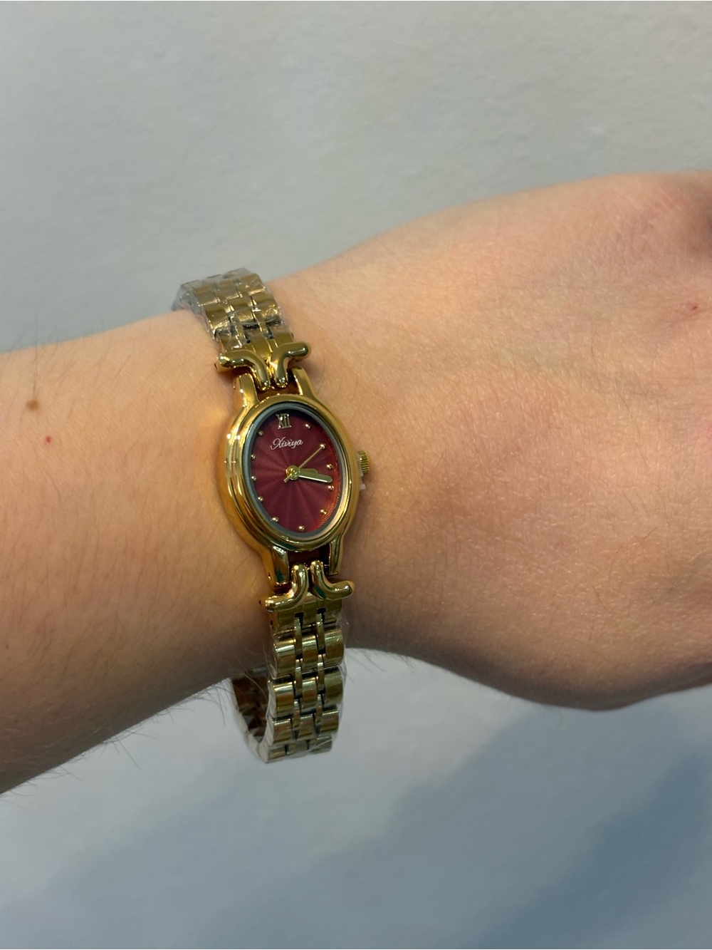 Gold Bracelet Watch with Red Dial